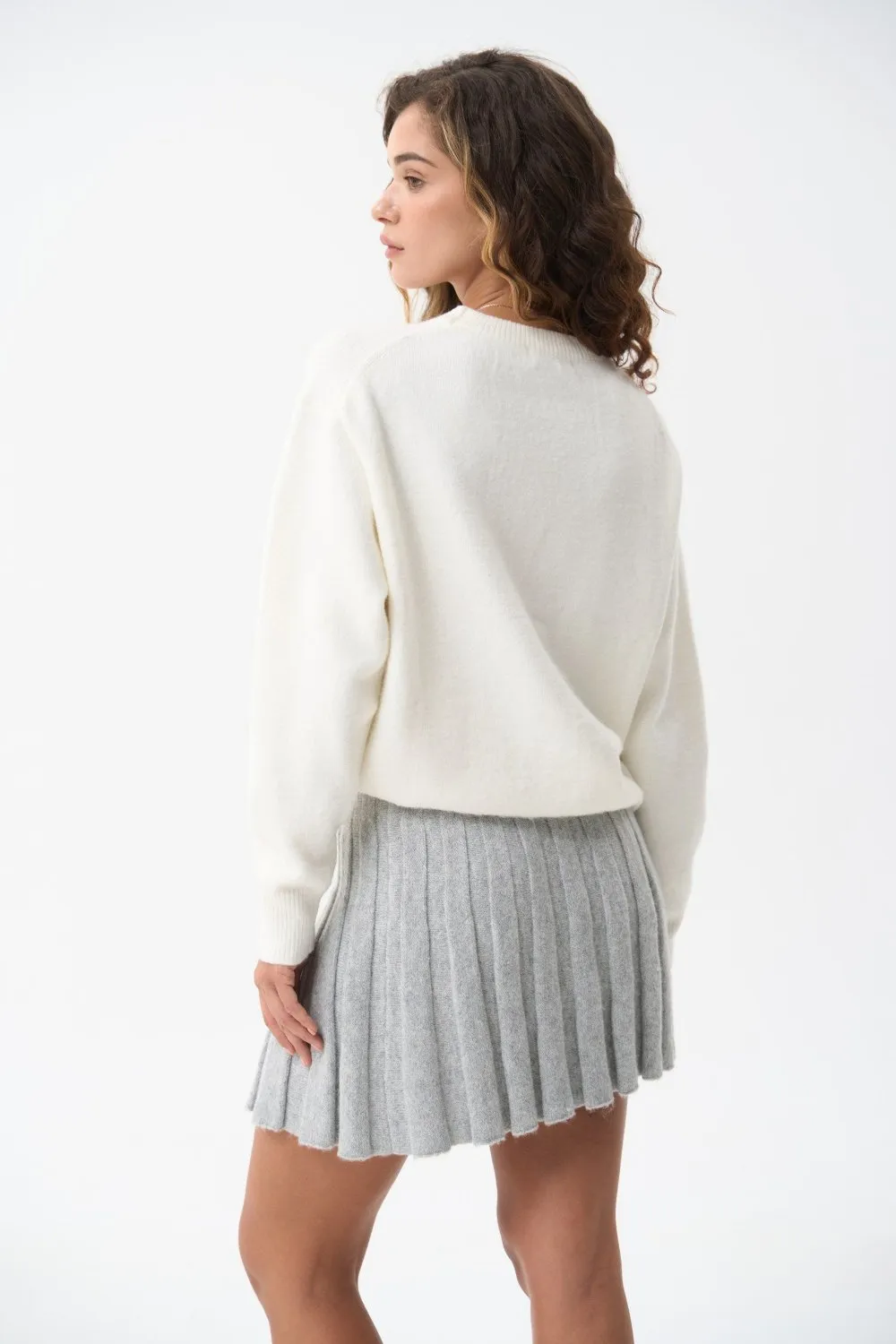 Wool sweater in color milk